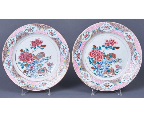 Two Chinese famille rose plates, Qing dynasty, Qianlong period, painted with quail, peony and other plants around a blue holl