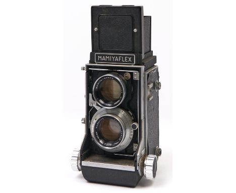 A Mamiyaflex C2 twin lens reflex medium format camera, with Mamiya-Sekor 105mm F3.5 lenses and caps  In apparently working or