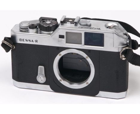 A Voigtlander Bessa-R SLR 35mm camera body, with original case  In apparently working order, camera sticky