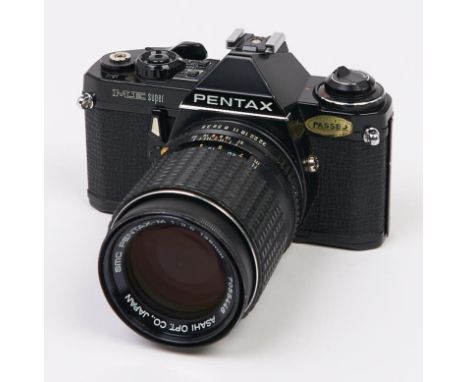 A Pentax ME Super SLR 35mm camera, with SMC Pentax-M 135mm F3.5 lens  In apparently working order, good condition, lens has s