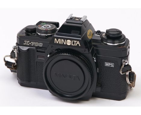 A Minolta X-700 MPS SLR 35mm camera body, with body cap and Minolta cap  In apparently working order, good condition