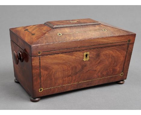 A Victorian ebony and brass line inlaid mahogany tea caddy, c1840, of sarcophagus shape, the fitted interior retaining covers