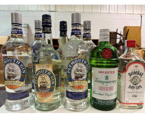 Gin in litre bottles. Plymouth (6); Tanqueray Import (2); Bombay Import (70cl); (together 9 bottles)
