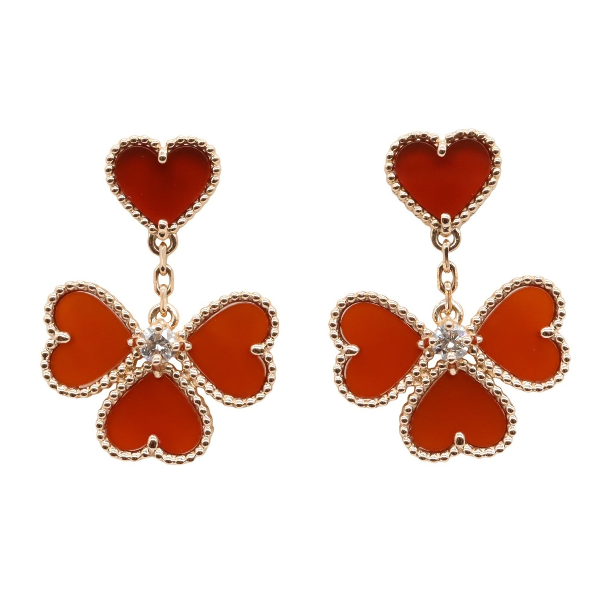 Van Cleef & Arpels Sweet Alhambra Heart Earrings in 18K Pink Gold with Diamonds and Carnelian. Avail