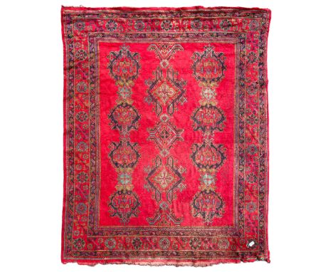Early 20th century Western Anatolia Turkish Oushak crimson ground carpet, the field decorated with rows of Herati and Palmett