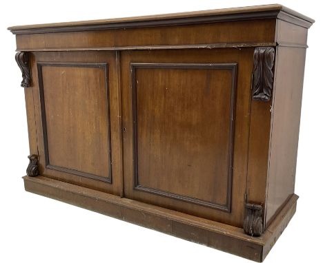 Early 19th century mahogany chiffonier sideboard, fitted with two frieze drawers over two panelled cupboards, flanked by foli
