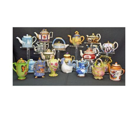 Vintage, this Twenty (20) Piece Nini Miniature Decorative Tea Pot Collection features an assortment of colors, styles, eras, 