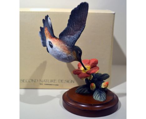Hand made, Hand painted replicated by Second Nature Designs from the Award Winning Carver Ma Hai Feng. Inspired by American W