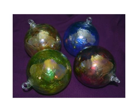 Hand created by the Artists of The Glass Eye Studio, established in 1978 in the USA, Each Classic Round Ornament is inspired 