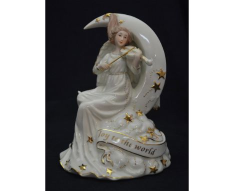 Glazed Porcelain Decorated, hand created, hand painted Figurine featuring an Angel in Ivory with Gold Accents, Sitting on the
