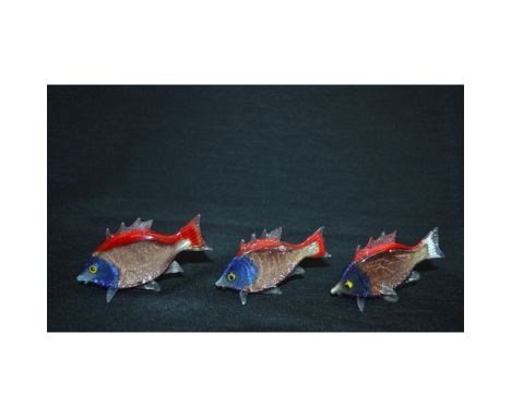Vintage, Handmade, mouth-blown, Red/Blue with mult-shades of colors blended through-out the school of Tropical Fish. Hand cra