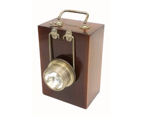 Eveready adjustable carrying lamp with folding handle and ?The Flag? dry cell battery, in a mahogany case, H 19.8cm, 32cm ove
