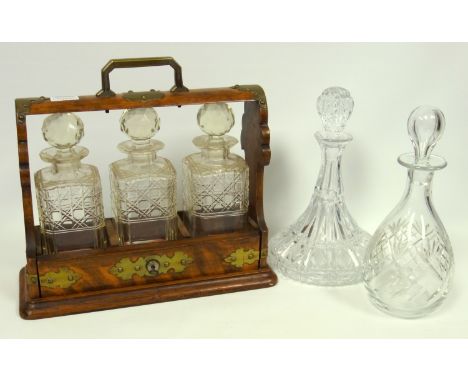 Late Victorian Presentation oak tantalus with 3 semi-cut square decanters (1 with rim chips), stoppers and brass mounts, the 