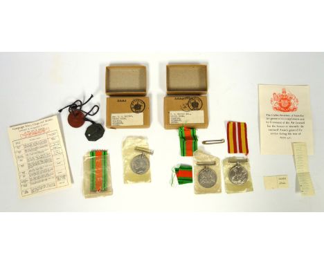 Second World Defence and War medals with ribbons and leaflets awarded to T.H. Whitney in original box, Defence medal to Mrs T