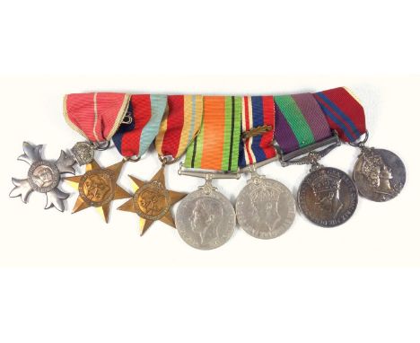 Group of 7 WWII medals comprising the MBE, 1939-45 and African Stars, Defence and War medals, General Service medal with clas