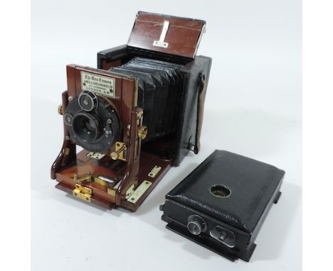 An early 20th century plate camera, bearing a label for The Ana Camera by James A Sinclair and Co Ltd, 54 Haymarket, London, 