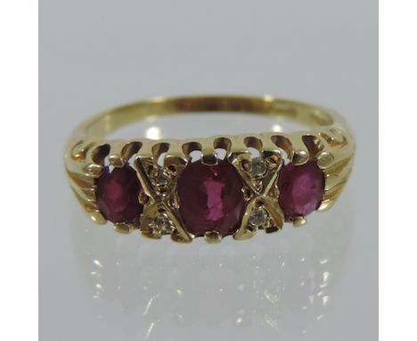 An 18 carat gold ruby and diamond ring