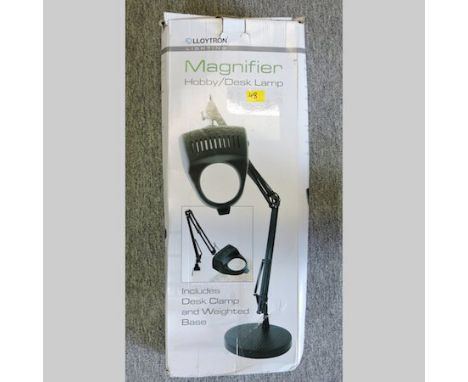 A table magnifier lamp