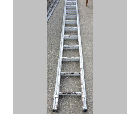 A large aluminium ladder, in two sections, 484cm closed