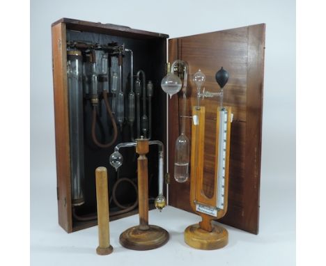 A testing kit, in a fitted wooden travel case, and a differential thermometer, together with a large collection of over 50 me