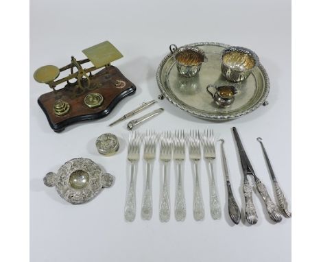 A collection of silver plated items to include a salver, together with a set of Victorian postal scales 