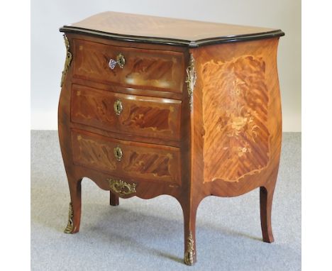 A French marquetry bombe commode, with gilt metal mounts, on cabriole legs, 81cm