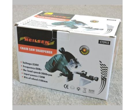 A chainsaw sharpener