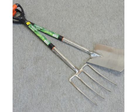 A stainless steel digging fork and spade