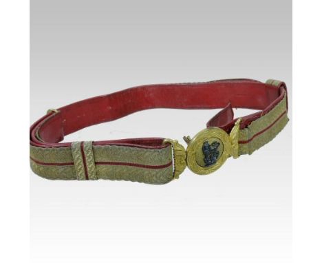 A Victorian military General Service Army belt, with red leather and gilt braid, the gilt metal clasp decorated with a lion b