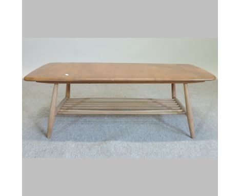 An Ercol light elm coffee table, 105cm