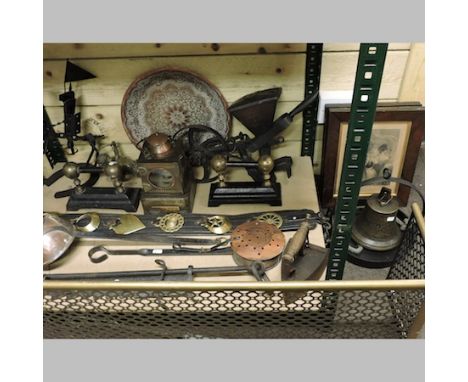 A pierced brass fender, together with a railway lamp, stamped Newmarket, a bell dated 1834, a chestnut roaster, horse brasses