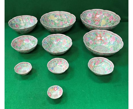 A graduated set of ten late 20th Century Chinese Gingdezhen polychrome decorated bowls bearing faux Qianlong marks (boxed) CO