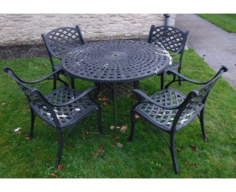 A metal garden table and chairs