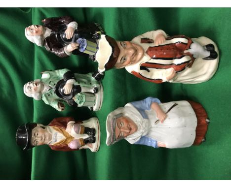 Two 19th Century Staffordshire character jugs as "The Night Watchman", one in green jacket, the other in brown together with 