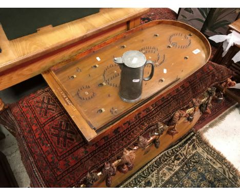 A collection of items comprising a Kut Hing Swatow pewter tankard with engraved decoration, a vintage Bagatelle board inscrib