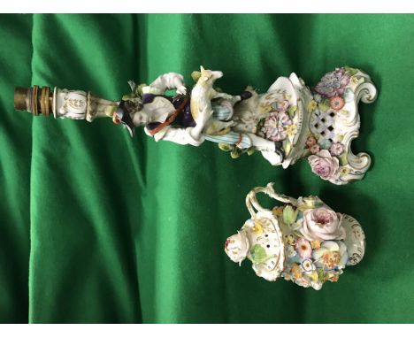 A Capo di Monte figural candlestick as a table lamp decorated with sheep shearer and floral encrustations together with a flo