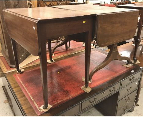 A 19th Century mahogany sofa table, the rounded rectangular drop leaf top over two frieze drawers on end pillar supports to s