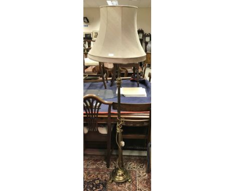 A Brass telescopic column lamp standard converted to electrical standard lamp, together with a modern teak baluster shaped ta