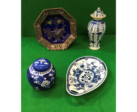 A blue and white leaf shaped dish decorated with panels of figures and flowers, bearing four character mark to base, a Chines