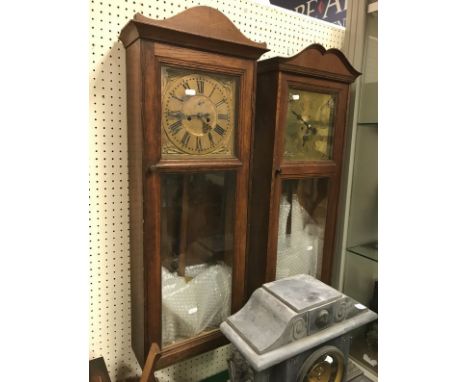 A oak cased drop dial wall clock, the eight day movement by Samuel White together with another similar eight day clock with p