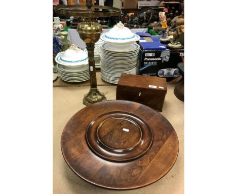 A circa 1900 brass column oil lamp converted to electricity together with a mahogany tea caddy and lazy Susan