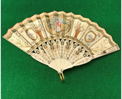 A 19th Century French fan with carved and painted ivory sticks, the vellum ground decorated with figures in 18th Century dres