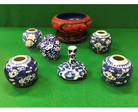 Five Chinese blue and white miniature ginger jars (one with cover), a small blue and white vase and cinnabar lacquered bowl o