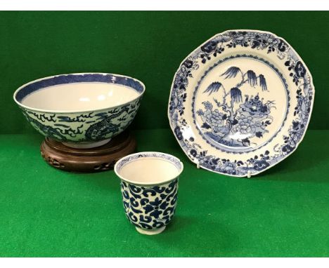 A Chinese Kangxi blue and white bowl decorated with four toed dragons, bearing four character mark to base, a blue and white 