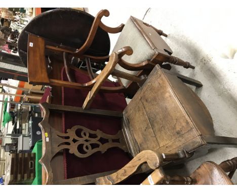 A 19th Century oak commode armchair in the Provincial Chippendale taste and a 19th Century mahogany bar back commode armchair