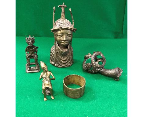 A collection of West African metal ware items to include a Benin style bust of a woman's head and shoulders, a Bamileke ornam