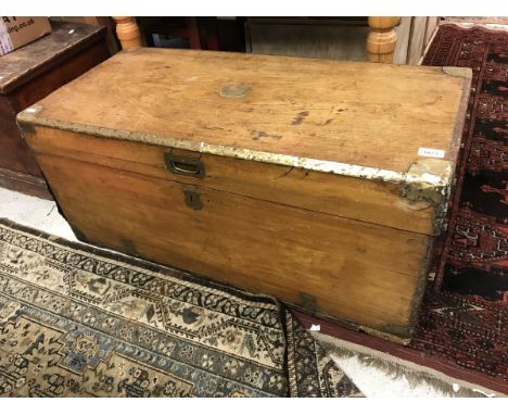 A 19th Century camphor wood trunk with brass corners and embellishments