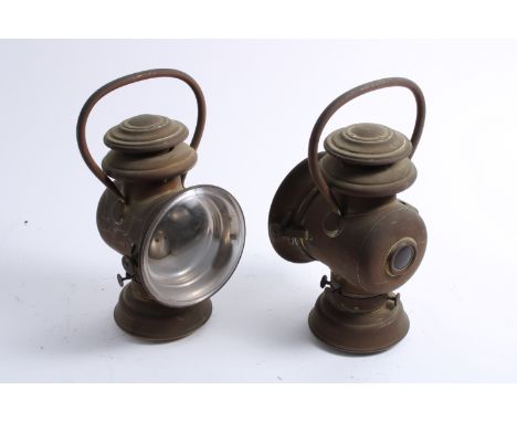 A pair of Model 820 oil illuminated sidelights, circa 1910,brass with 5 inch diameter convex lens (weathered). (2)Lot to be s