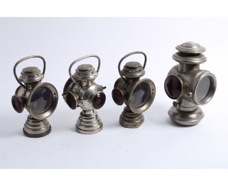A pair of 'The Neverout' oil illuminated lamps, by the Rose Mfg Co, American, circa 1905,nickel plated brass; together with a