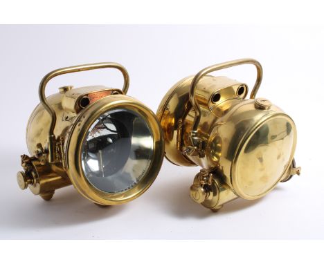 A pair of Rotax 'Roadlight F95265'  self-generating acetylene headlamps, British, circa 1910,each brass body with single cros